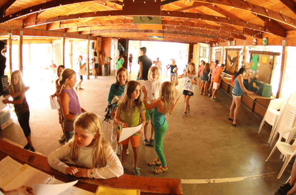 Indoor view of kids playing with games and each other in a meeting space